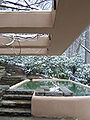 Winter picture of Fallingwater guest house plunge pool trellis